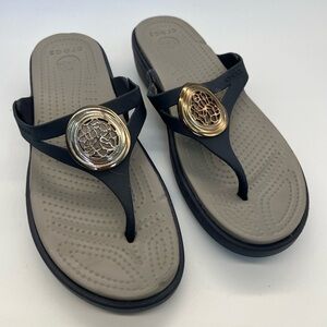CROCS Women’s  Thong Sandal with Gold Medallion